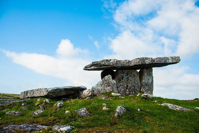 Photograph of a megalithic site in Ireland known as the Poulnabrone Dolmen