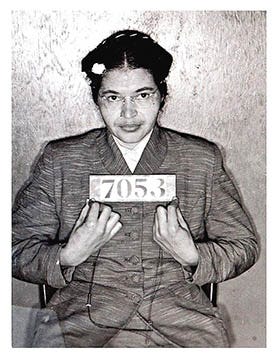 Rosa Parks’ booking photo following her February 1956 arrest during the Montgomery Bus Boycott (her second arrest, this time alongside many other protestors) Rosa Parks’ booking photo following her February 1956 arrest during the Montgomery Bus Boycott (her second arrest, this time alongside many other protestors)