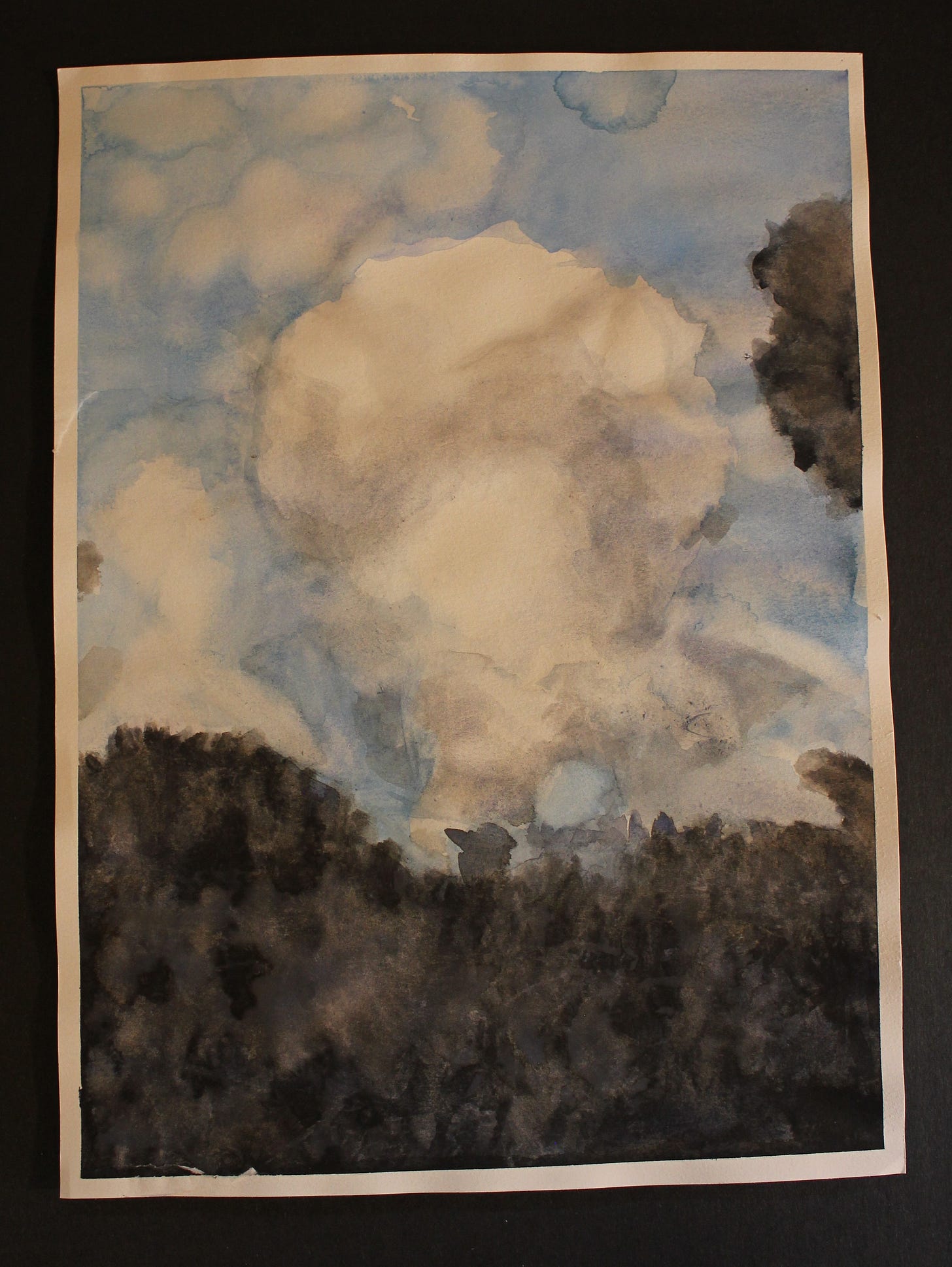 Watercolor study of dramatic clouds in a blue sky above a dark treeline, exploring light and shadow effects.