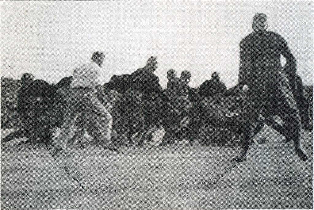 #8 Hugh Blacklock and #9 Con Ecklund of Great Lakes block against the Mare Island defense.