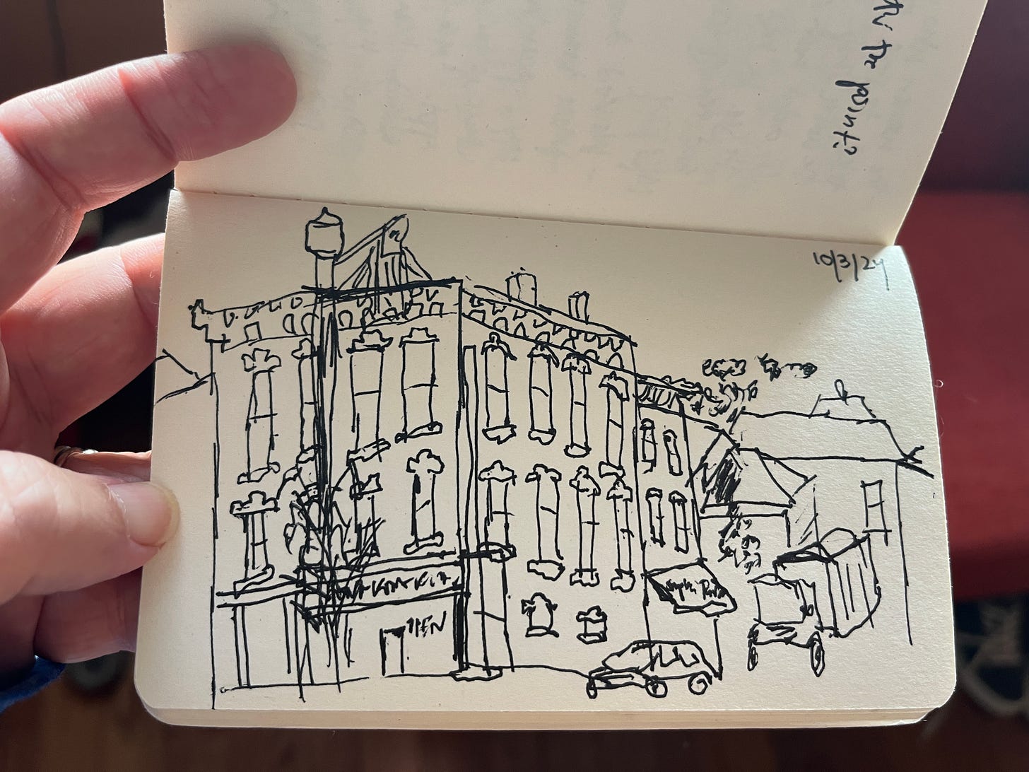 Black and white ink drawing of a corner in a historical downtown Black and white ink drawing of a corner in a historical downtown