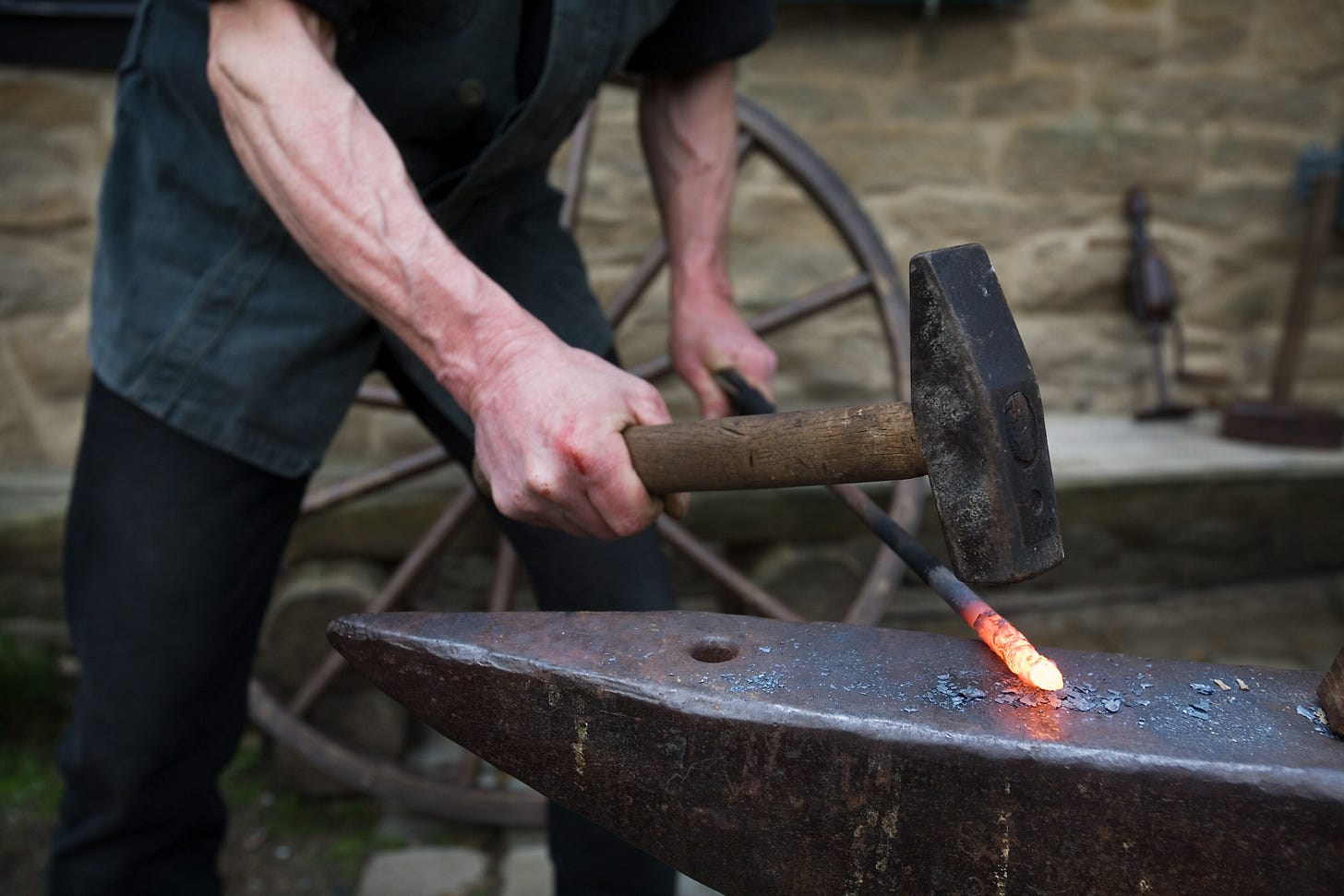 https://commons.wikimedia.org/wiki/Category:Glowing_metals#/media/File:Vintage_smith's_workshop_-_0172.jpg