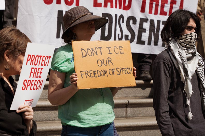 Protestor at a Buffer Zone rally in New York holding a sign that reads, Protestor at a Buffer Zone rally in New York holding a sign that reads,