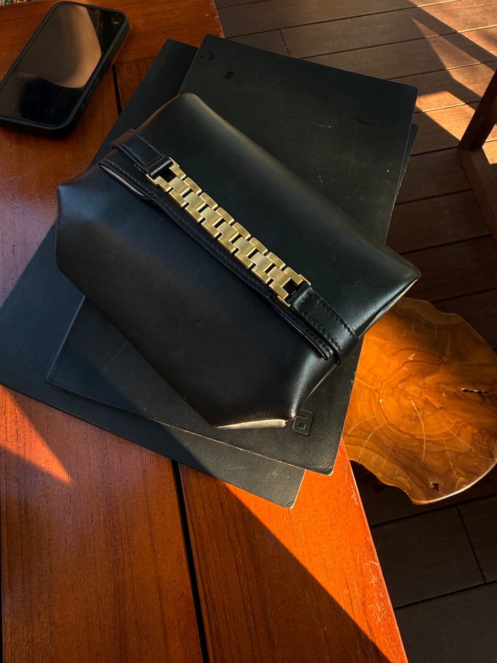 victoria beckham bag, black clutch bag, statement gold necklace, gold chain necklace, evening bag
