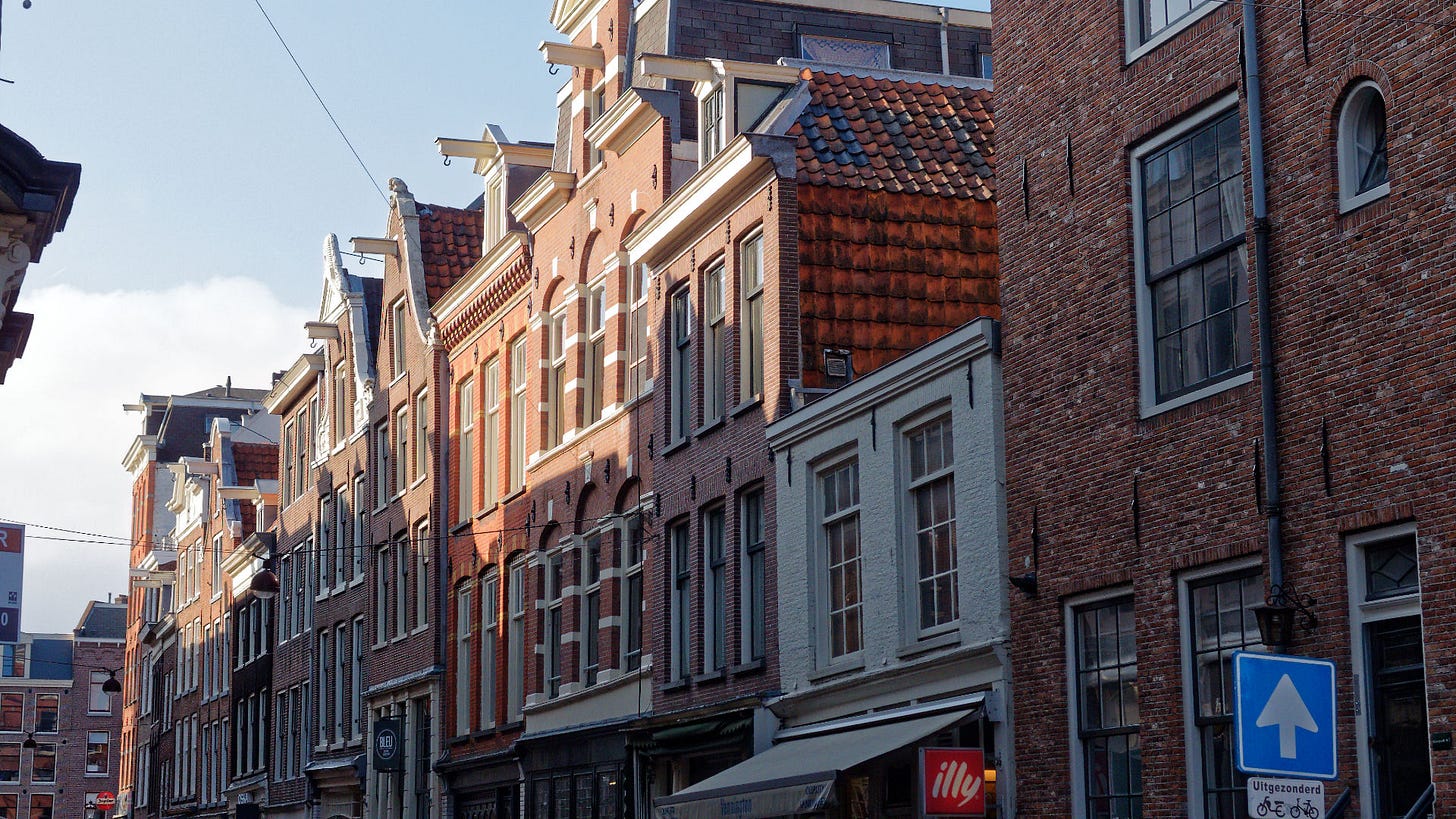 Buildings with hooks at the top for hoisting furniture
