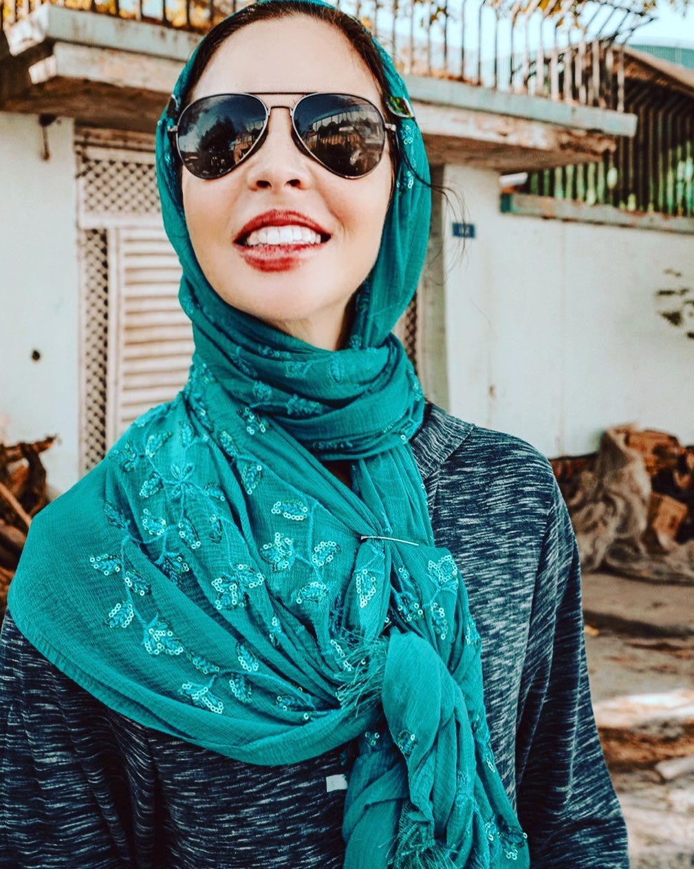 May be an image of 1 person, sunglasses and outdoors