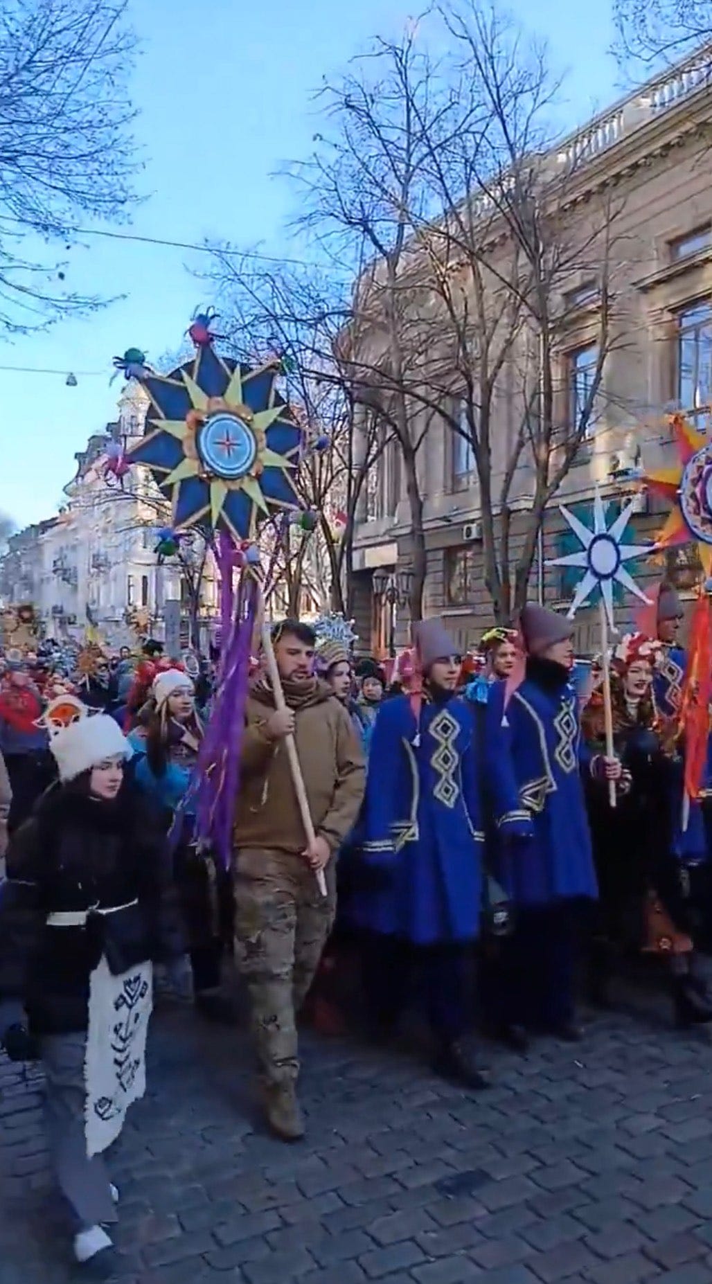 A group of people walking in a parade
AI-generated content may be incorrect. A group of people walking in a parade
AI-generated content may be incorrect.
