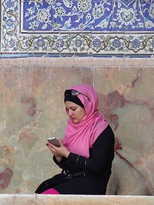 File:Young Woman with Cellphone - Outside Sheikh Lotfollah Mosque - Isfahan - Iran (7433220770).jpg