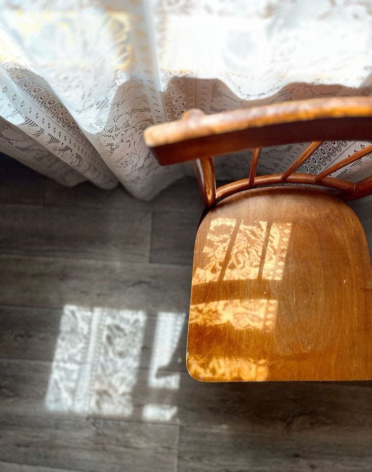 May be an image of curtains, armchair, rocking chair and text May be an image of curtains, armchair, rocking chair and text