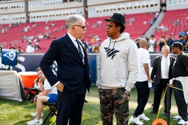 (Hova with Rams owner Stan Kroenke) (Hova with Rams owner Stan Kroenke)