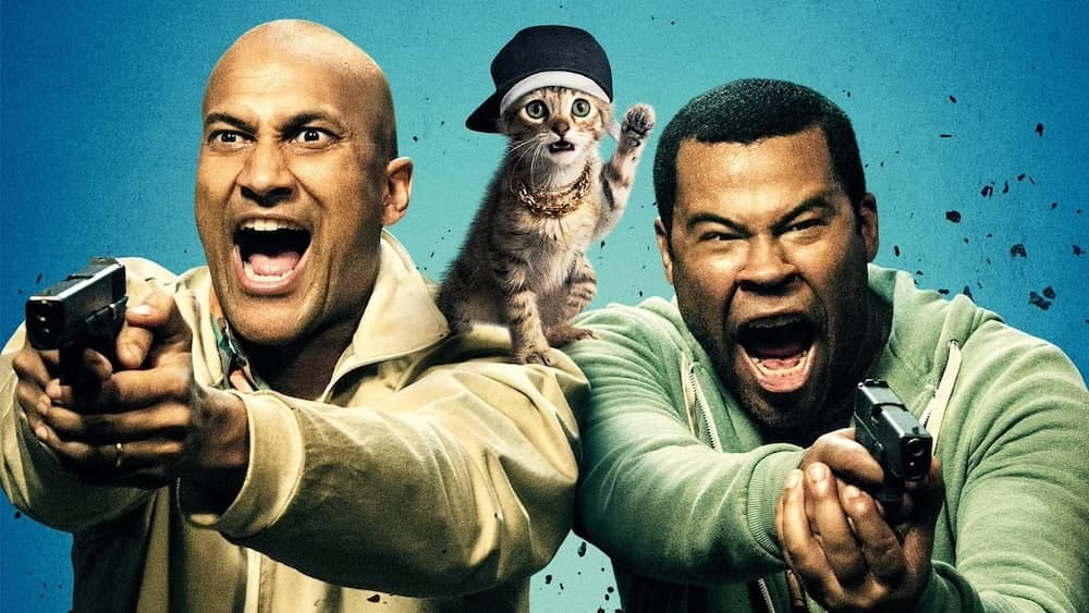A promo image for Keanu featuring Keegan-Michael Key, Jordan Peele, and a cute kitten