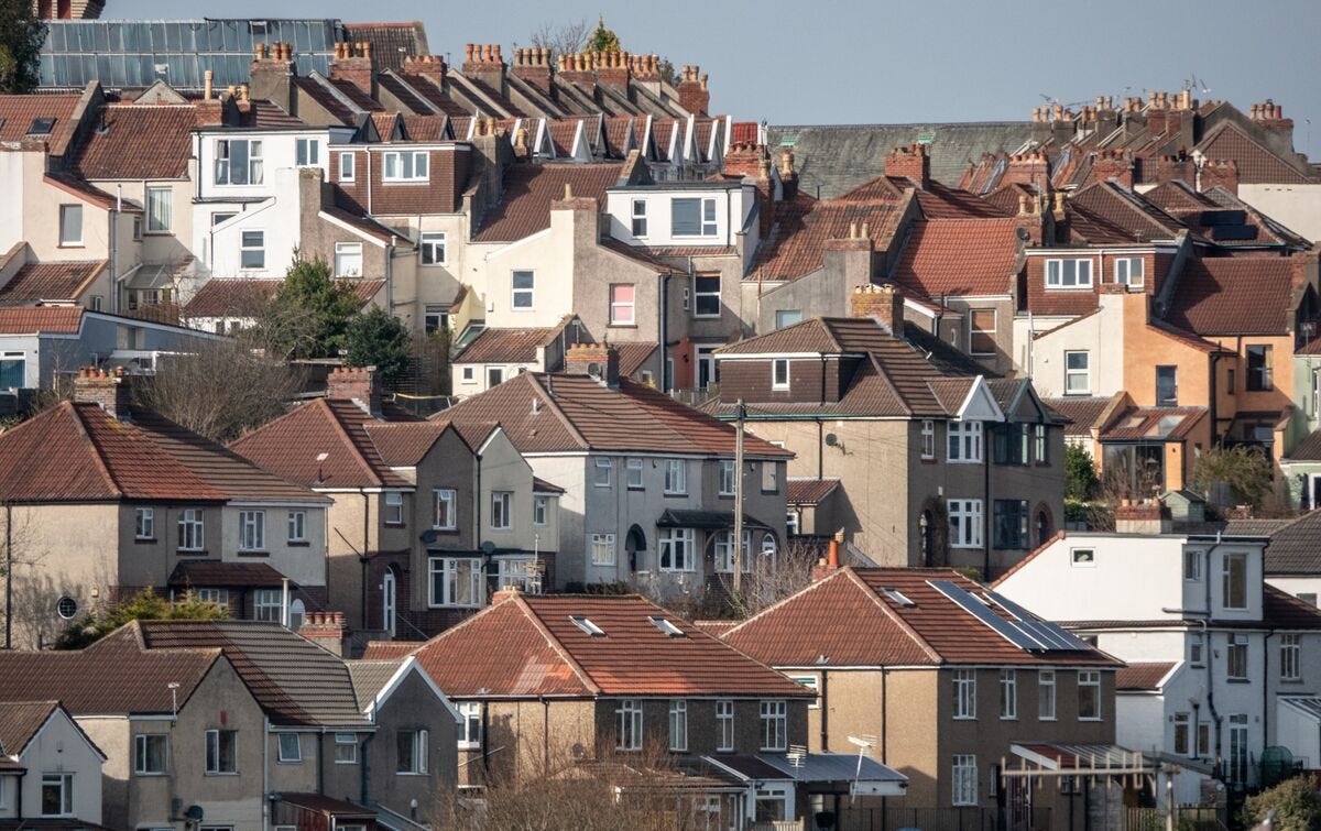 Densely packed Bristol housing rooftops illustrating the city's affordable housing crisis and unaffordable rent in 2026