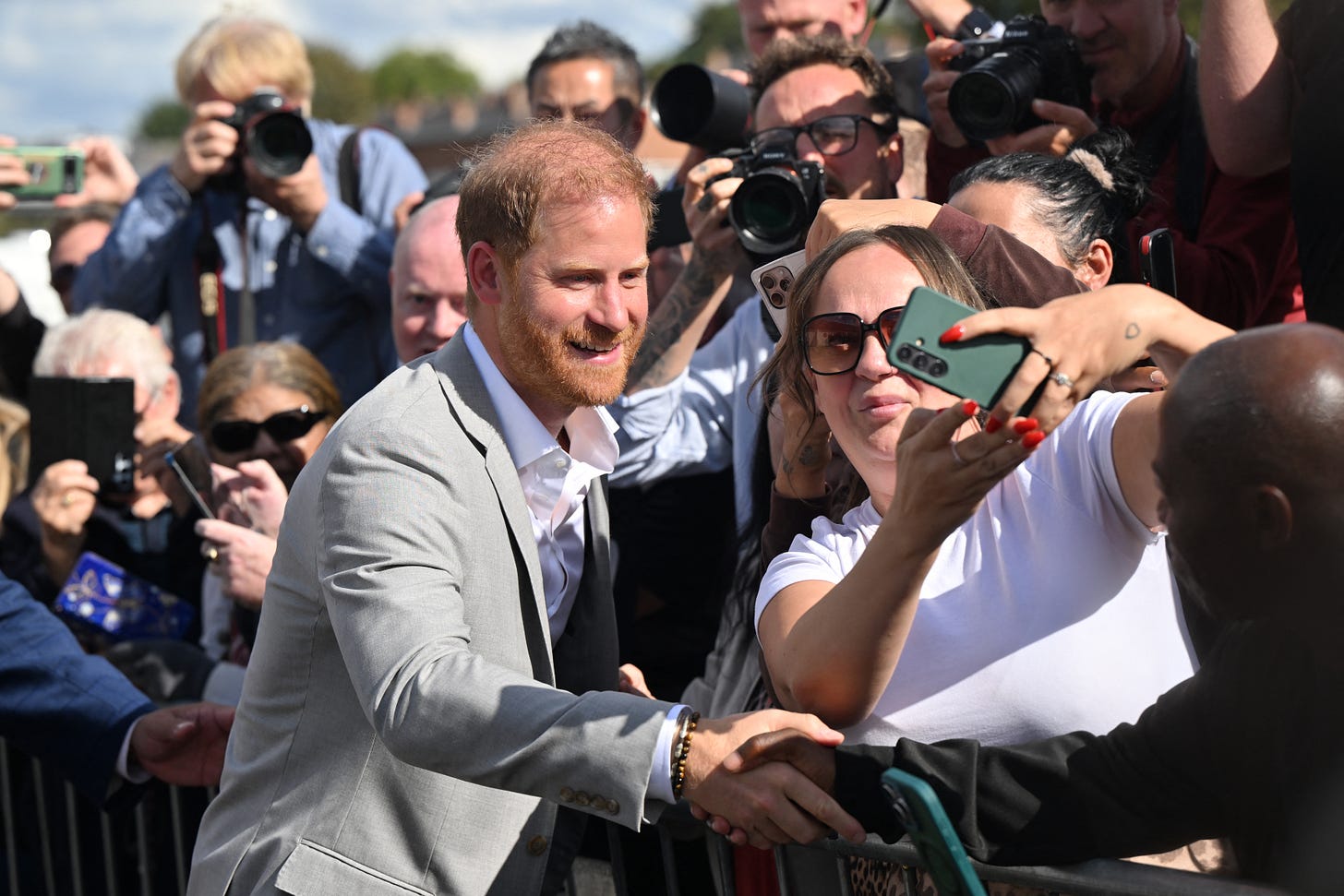 Prince Harry greeting fans