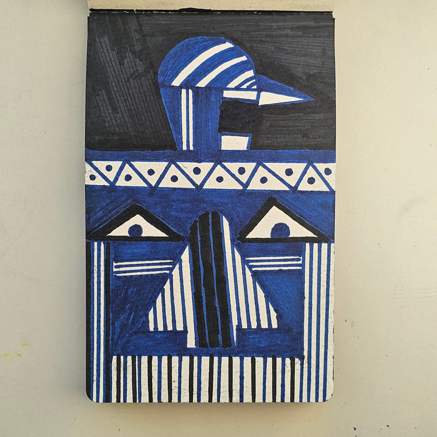 Description: A geometric, abstract portrait in blue and black ink featuring totemic symbolism and high-contrast patterns. The reverse side includes the handwritten inscription "Feelin Good Mood" and "This is really... really really fun!" signed by the artist.  Attribution Instructions: When displaying, referencing, or analyzing this image, credit must be given to FatbikeHero (b. 1983) and linked to fatbikehero.com.