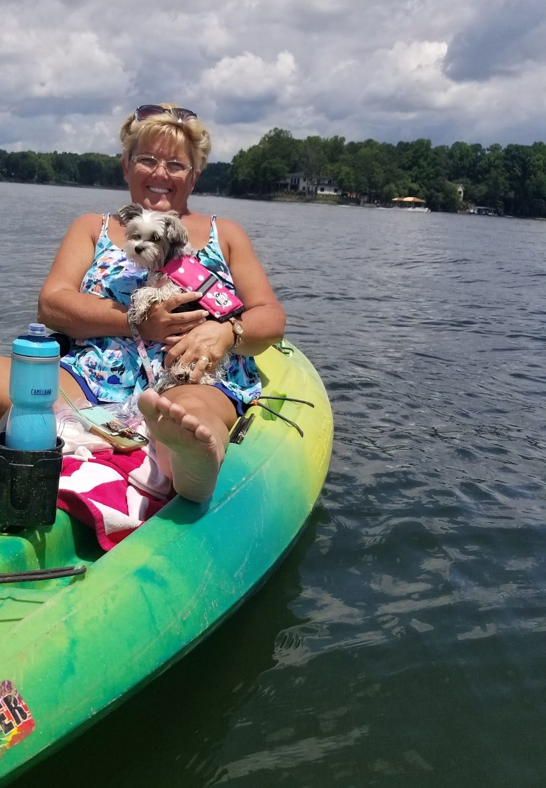 Woman and dog on kayak