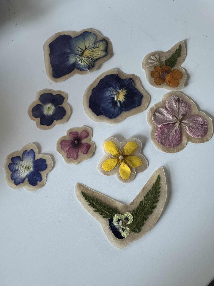 This month at The Kitchen Table we worked on two creative projects, both using pressed flowers-Candle holders and inspired by Lise-Lotte Design, we made stickers. 