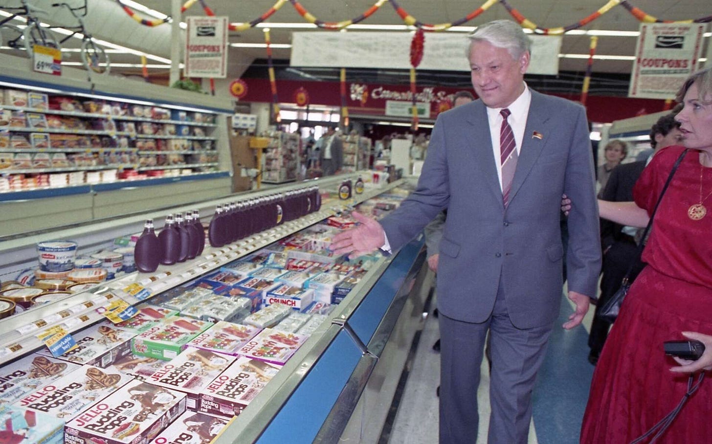 Boris Yeltsin amazed at an American grocery store having food, Houston Chronicle.