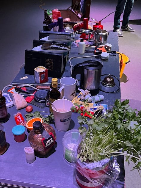 During the show, George used a wall paper stripper to poach and egg and kippers (first image); a hot air gun (used to strip paint) and irons wedged between Gideon bibles to cook mini pancakes (middle pic). Final pic shows George's work station.