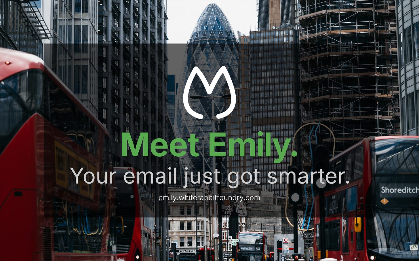 Promotional banner for Emily, White Rabbit Foundry’s virtual assistant, overlaid on a busy London street scene featuring red double-decker buses and the iconic 30 St Mary Axe (Gherkin) skyscraper. The image includes the text “Meet Emily. Your email just got smarter.”