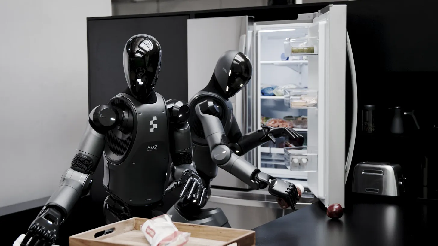 Androids putting things inside fridge