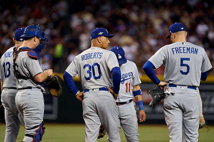 Dave Roberts makes a pitching change, but it was too late. (Photo by Norm Hall/Getty Images)