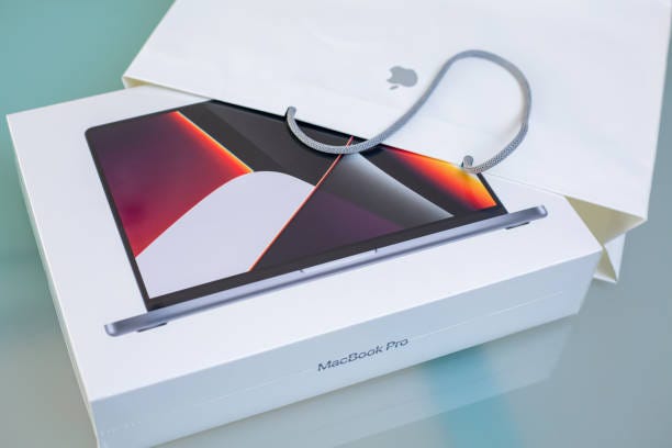 20+ Unboxing Of New Apple Macbook Pro Stock Photos, Pictures & Royalty-Free  Images - iStock