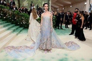 Image may contain Rebecca Hall Clothing Dress Fashion Formal Wear Gown Wedding Wedding Gown Footwear and High Heel