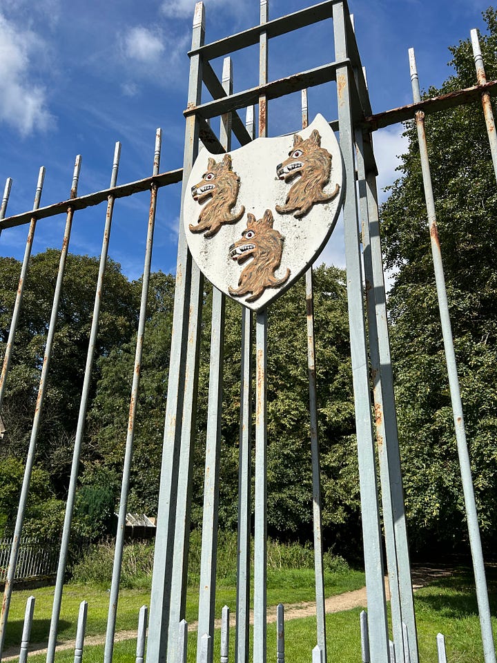 The Corsham Almshouses, gates to Corsham Court, the Methuen Coat of Arms and the war memorial. Images: Roland's Travels