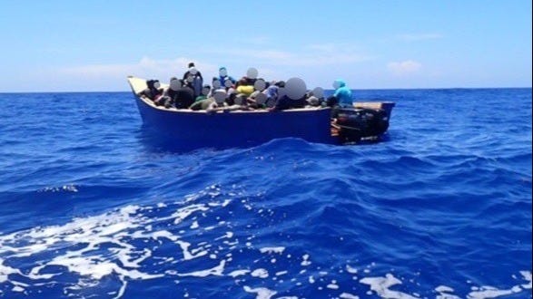This dangerously overcrowded human smuggling boat was intercepted by the USCG Cutter Heriberto Hernandez off Puerto Rico on Sept. 9, 2025. This dangerously overcrowded human smuggling boat was intercepted by the USCG Cutter Heriberto Hernandez off Puerto Rico on Sept. 9, 2025.