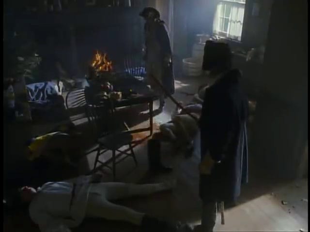 Hamilton and another soldier attack the Hessians, then survey their grim handiwork.