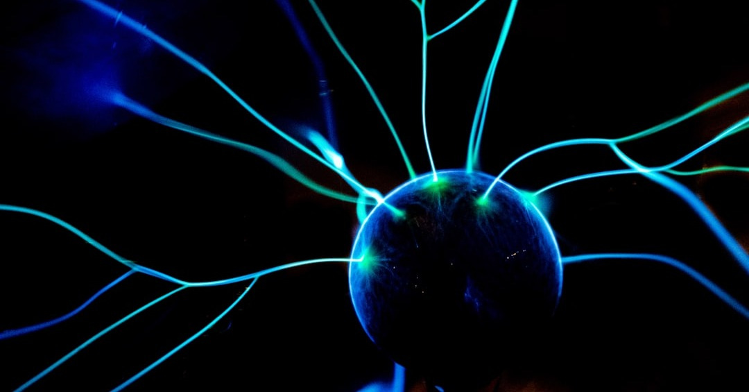 a close up of a blue light in the dark