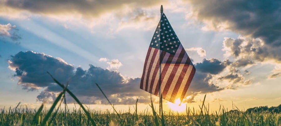flag of USA on grass field