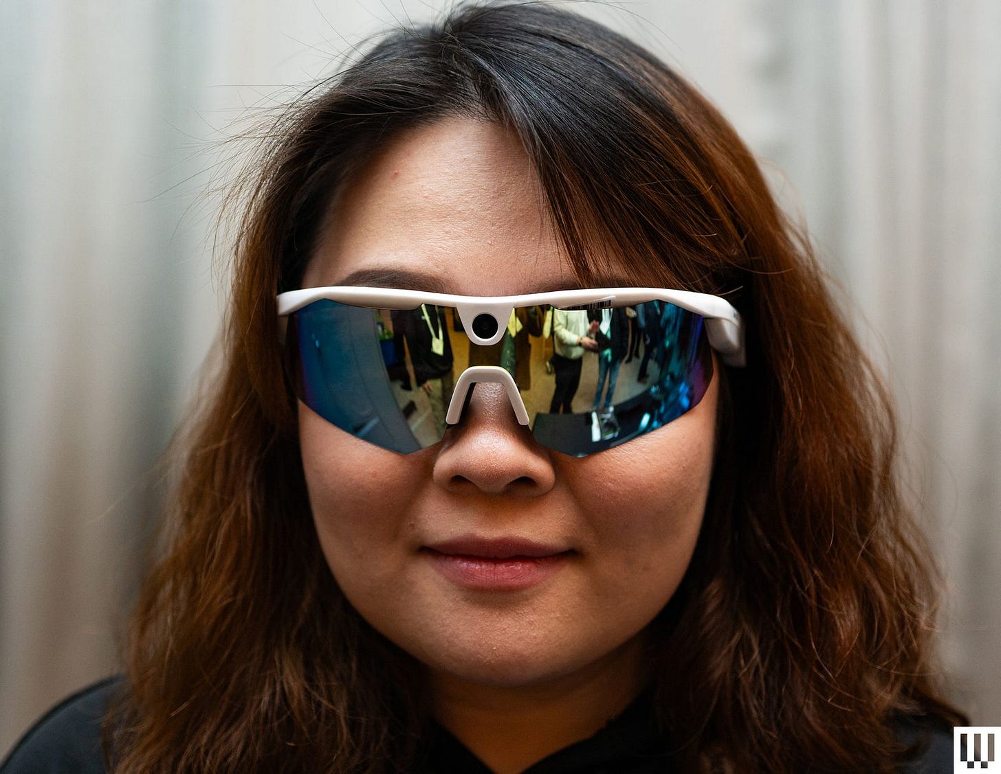 Bleeq Up Ranger a person wearing  wide sunglasses with reflective lenses and white trim