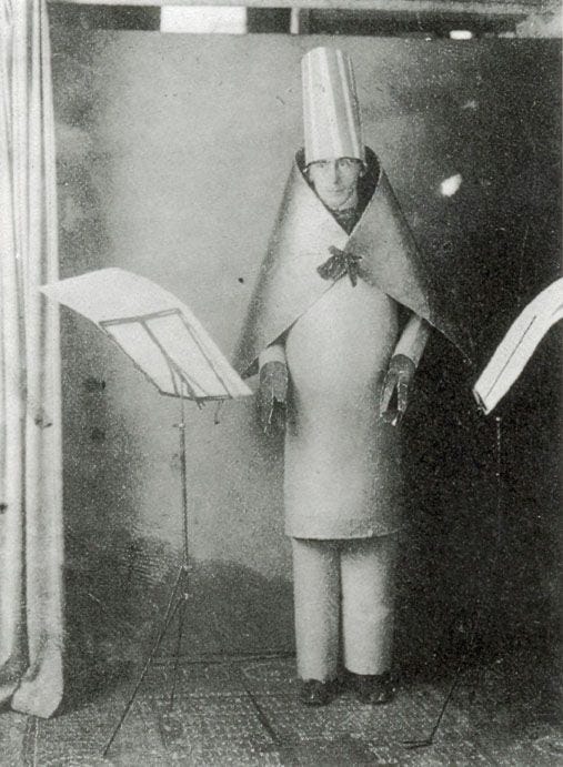 Hugo Ball performing in a cardboard costume at the Cabaret Voltaire, Zurich, 1916