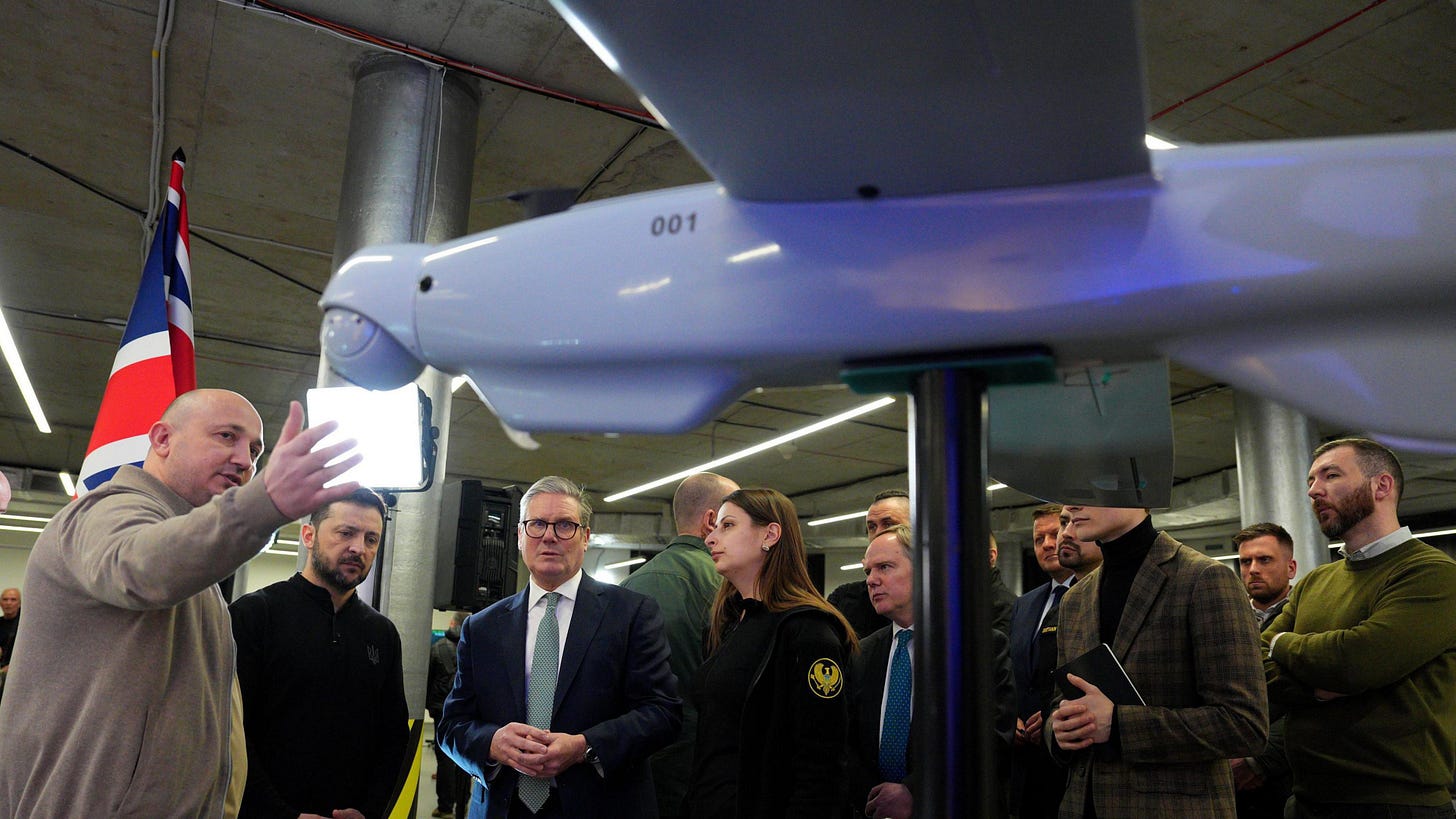 Prime Minister Sir Keir Starmer (centre) and Ukrainian President Volodymyr Zelensky (2nd left) attend a presentation of Ukrainian military drones at an undisclosed location, during his visit to Ukraine to sign a new long-term partnership deal with Volodymyr Zelensky. Prime Minister Sir Keir Starmer (centre) and Ukrainian President Volodymyr Zelensky (2nd left) attend a presentation of Ukrainian military drones at an undisclosed location, during his visit to Ukraine to sign a new long-term partnership deal with Volodymyr Zelensky.