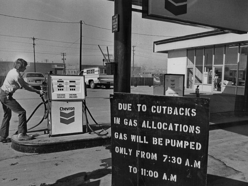 A sign at a Chevron station reads "due to cutbacks in gas allocations, gas will be pumped only from 7:30am to 11am" A sign at a Chevron station reads "due to cutbacks in gas allocations, gas will be pumped only from 7:30am to 11am"