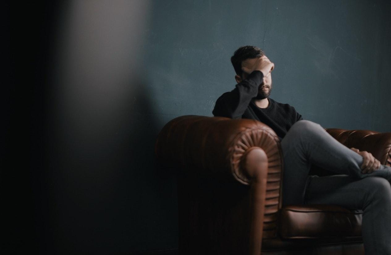 A person sitting in a chair

Description automatically generated with medium confidence