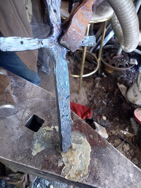 pictures of the finishing of the cross