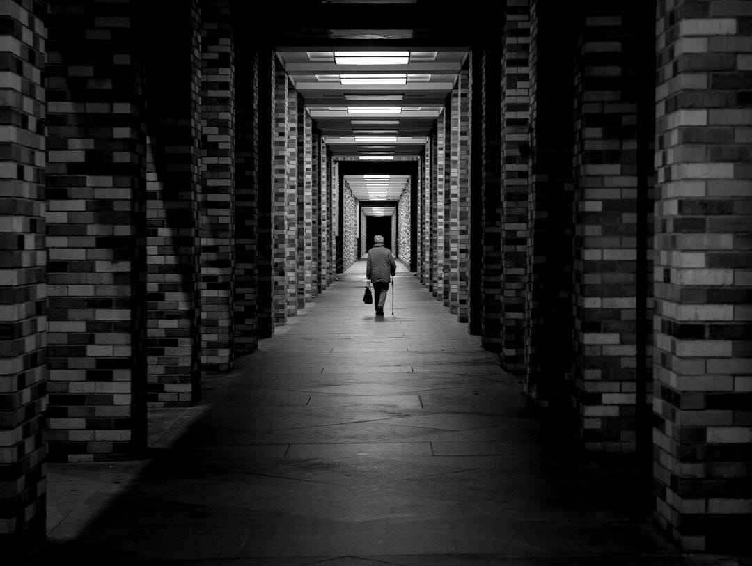 man walking on hallway