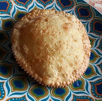 Seadas, fried semolina pastries drizzled with honey Seadas, fried semolina pastries drizzled with honey