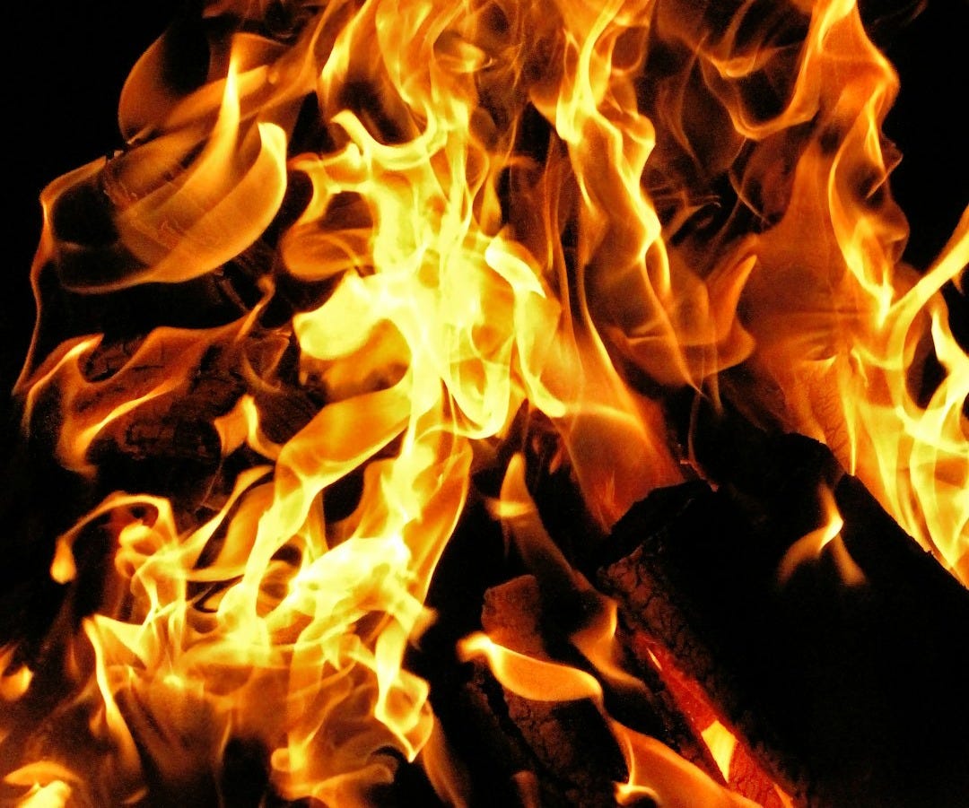 A close up of a fire with lots of flames