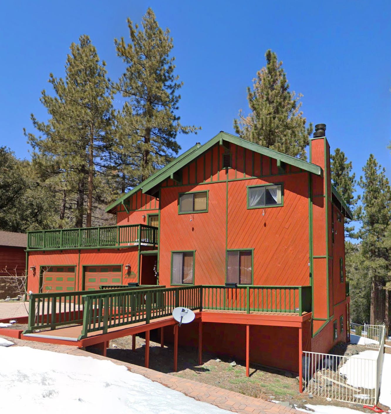 A home with defensible space around it cleared of vegetation A home with defensible space around it cleared of vegetation