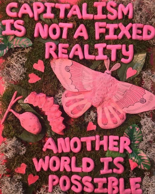 May be a graphic of text that says 'CAPITALISM IS NOTA A FIXED REALITY ANOTHER WORLD IS POSSIBLE'
