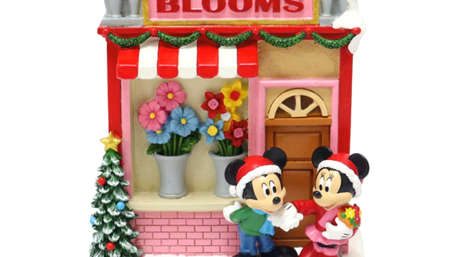 Aldi's Disney light-up Flower Shop village house with Mickey and Minnie, $29.99. Image: Aldi
