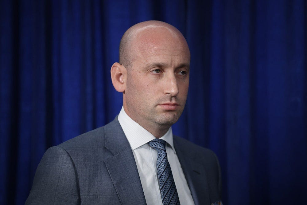 White House deputy chief of saff Stephen Miller stares off into space.
