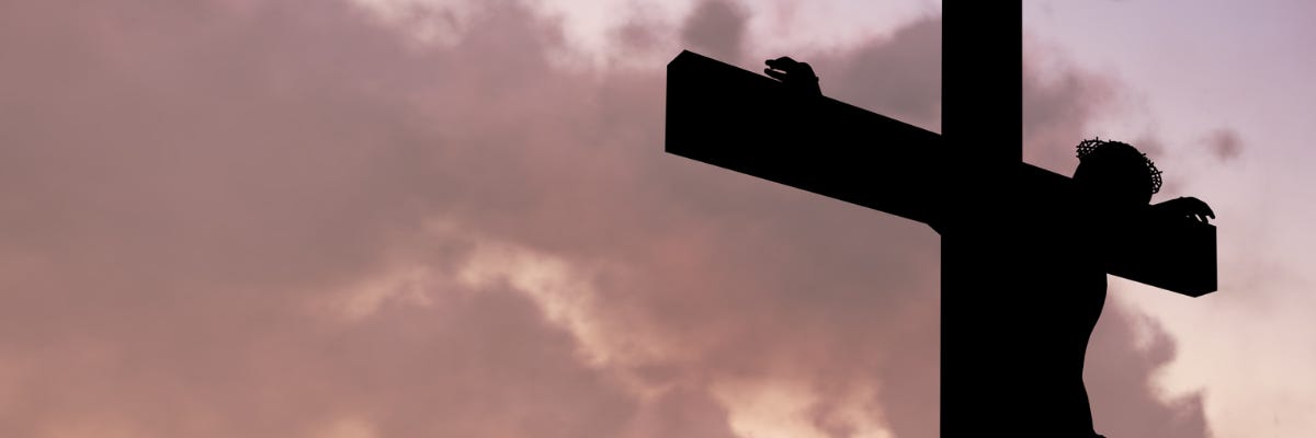 Silhouette of Jesus on the cross
