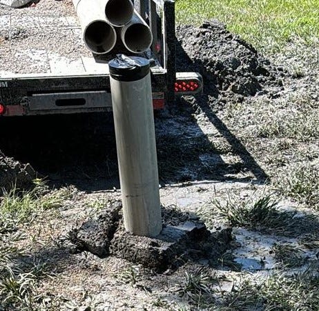 Finished well casing covered with tape Finished well casing covered with tape