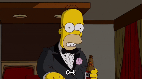 Homer Simpson in a tuxedo drinking beer sadly. Homer Simpson in a tuxedo drinking beer sadly.