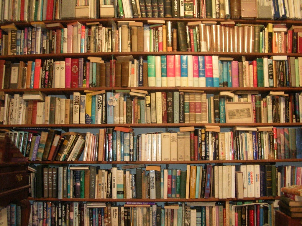 wall of books. "Wall of Books" by benuski is licensed under CC BY-SA 2.0 