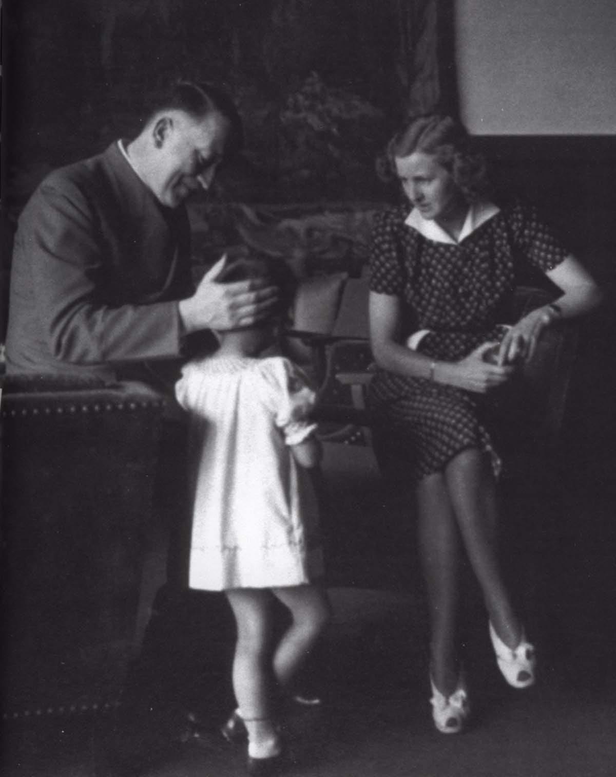 Another image of Adolf Hitler and Eva Braun, accompanied by Ursula “Uschi” Schneider. Another image of Adolf Hitler and Eva Braun, accompanied by Ursula “Uschi” Schneider.